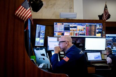 Traders On The Floor Of The NYSE As US Stocks Fall With Trade War Worries Overshadowing Slower Inflation